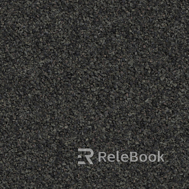 A gritty, textured image of gravel, showcasing small stones and pebbles in various shades of gray and brown, set against a backdrop of what appears to be a concrete or asphalt surface.