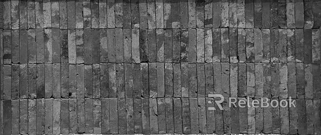 A textured brick wall in shades of red and orange, with signs of weathering and age, showcasing a rough, uneven surface and cracks between the bricks.