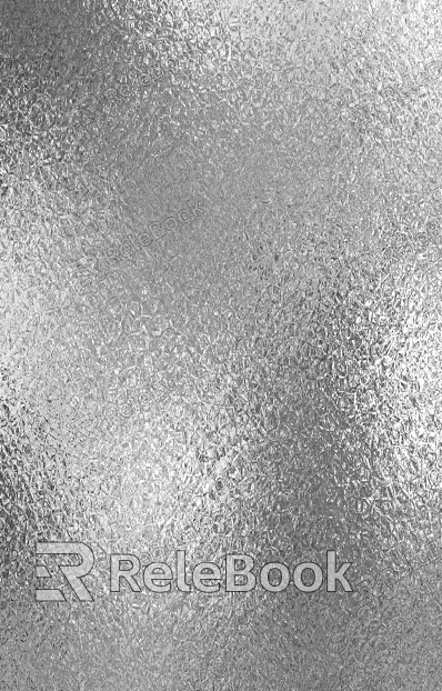 A textured image showcasing frosted metal, featuring a frosty, matte silver surface with subtle metallic sheen, speckled with icy frost and fine grain detailing, evoking a cool, industrial aesthetic.