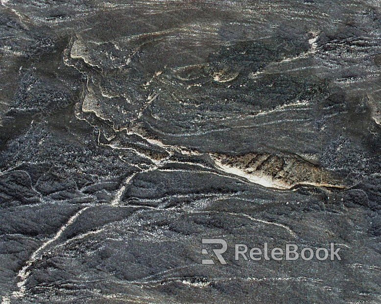 A close-up of a rugged, weathered rock surface, showcasing its intricate texture and natural beauty with shades of grey, brown, and green lichen.