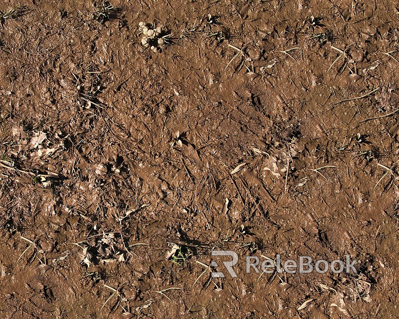 A black and white image of a textured, cracked mud surface, resembling a dried-up lake bed or riverbank, with small pebbles scattered throughout.