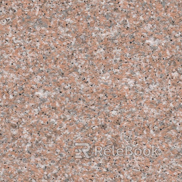 A smooth, light grey granite surface with fine black speckles and subtle veining, showcasing the natural beauty and durability of this popular stone material.