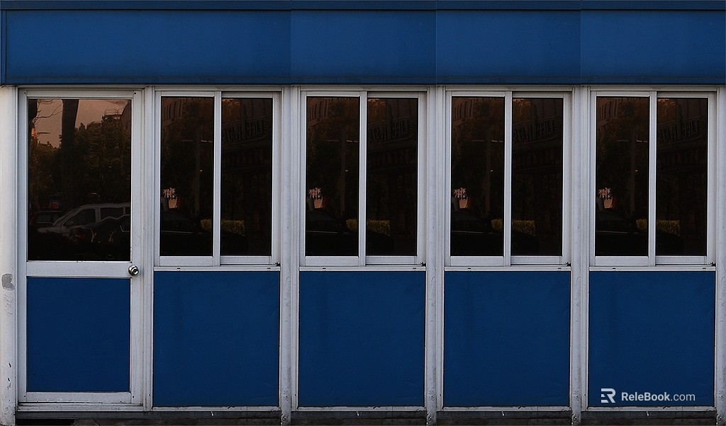 Blue and white frame glass door shop facade texture