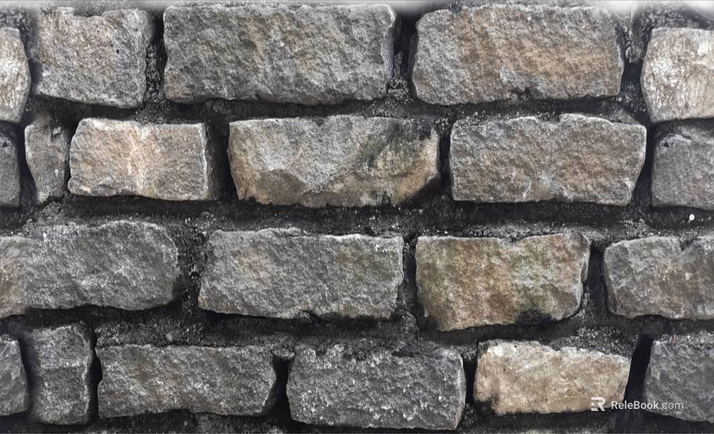 Grey rubble brick exterior wall finish texture