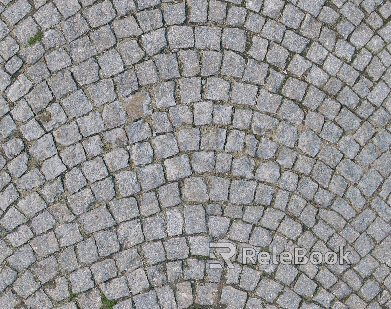 Rustic stone paving texture, featuring irregular, grayish-brown stones set in a random pattern, creating an organic and durable pathway surface.