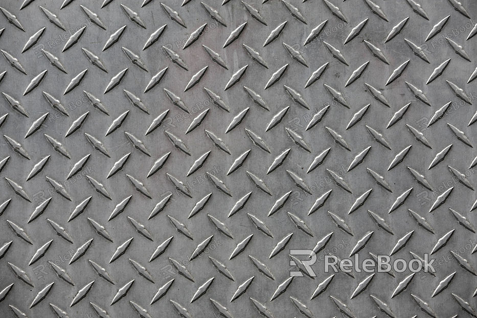 Diamond plate, characterized by its distinctive raised diamond pattern on a metallic surface, typically used for slip-resistant flooring or decorative elements in industrial design.