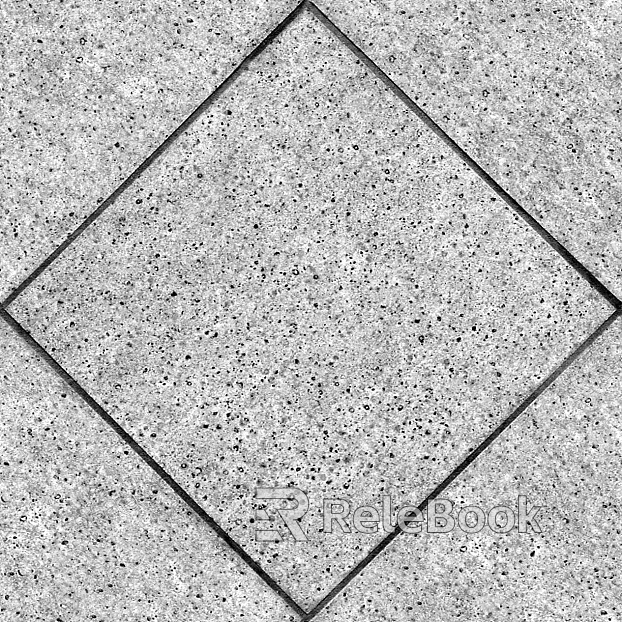 Close-up of a granite surface, revealing its characteristic speckled texture with prominent mineral grains in shades of grey, black, and white.