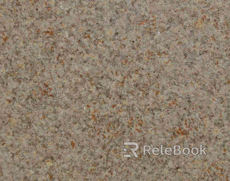 A close-up texture shot of granite, showcasing its characteristic flecks of white, grey, and black in a rugged, natural pattern. The stone's polished surface reflects light, highlighting its depth and complexity.