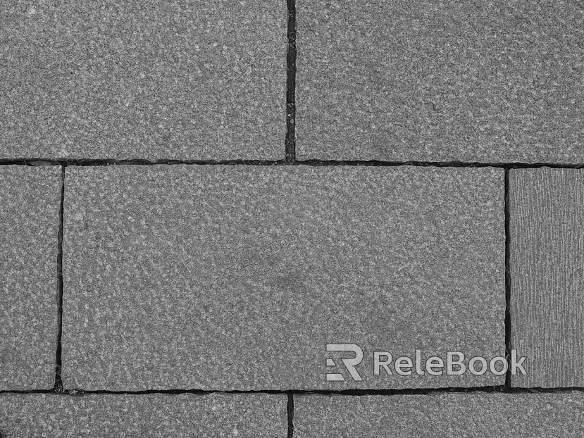 Permeable brick, characterized by its porous surface and interlocking design, enabling water to pass through, ideal for sustainable urban drainage systems.