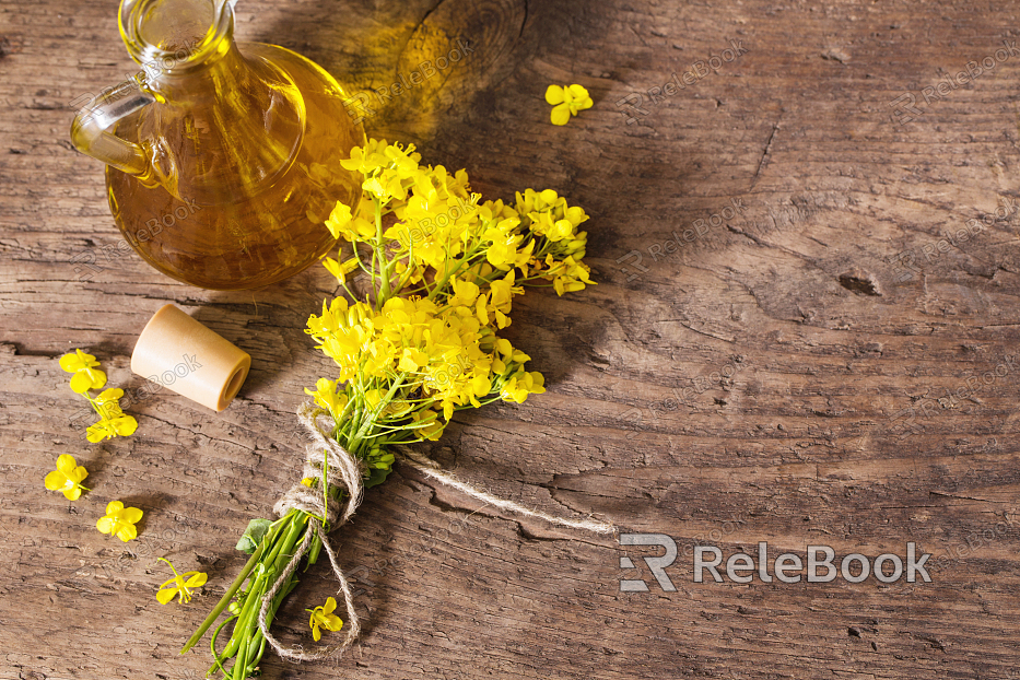 A vibrant bouquet of assorted flowers, including roses, daisies, and lilies, in shades of pink, yellow, and white, arranged together with lush green leaves, creating a stunning floral display.