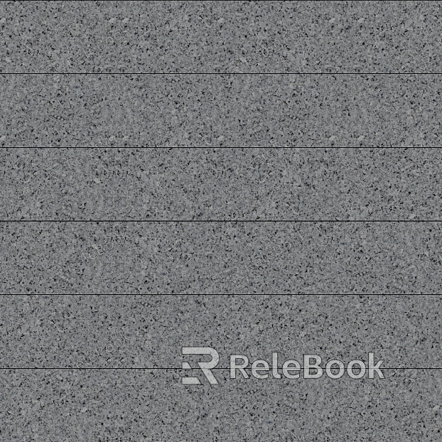 A close-up texture shot of granite, showcasing its characteristic flecks of white, grey, and black in a rugged, natural pattern. The stone's polished surface reflects light, highlighting its depth and complexity.