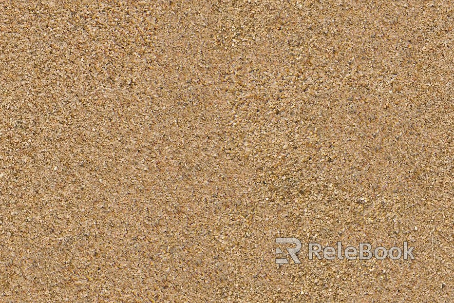 A gritty, textured image of gravel, showcasing small stones and pebbles in various shades of gray and brown, set against a backdrop of what appears to be a concrete or asphalt surface.