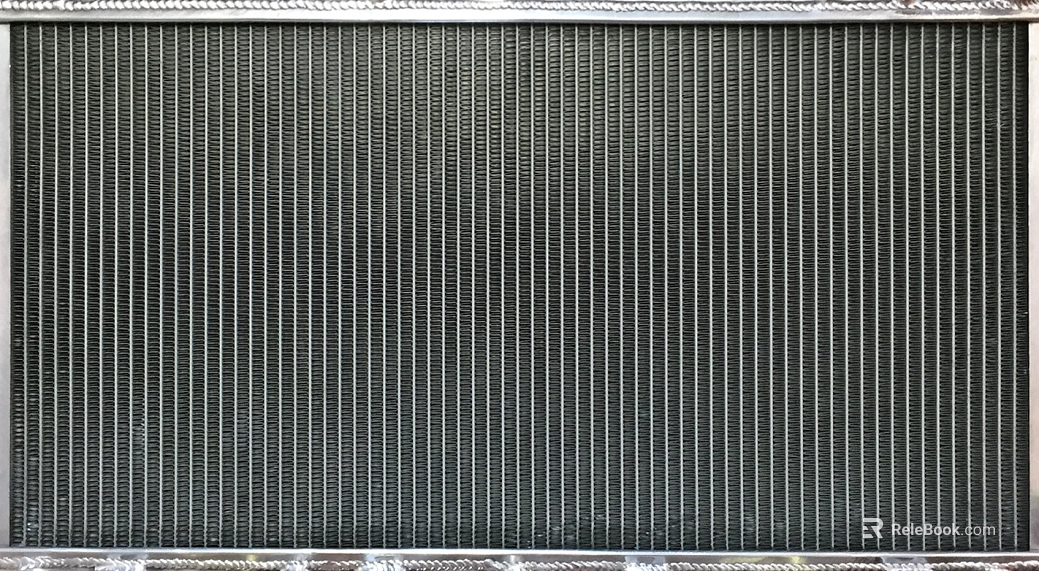 Silver gray perforated metal plate industrial wall texture